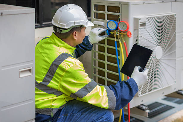 Professional Air Conditioning Repair technician working in Dobbin, TX